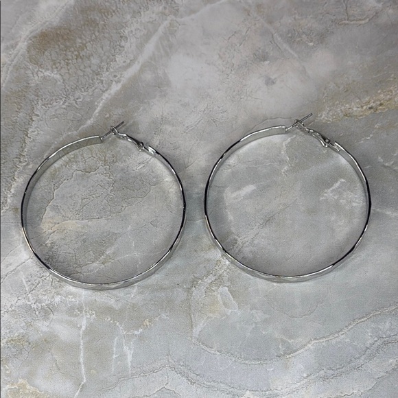 Elegant Silver Hoop Earrings - Picture 1 of 3